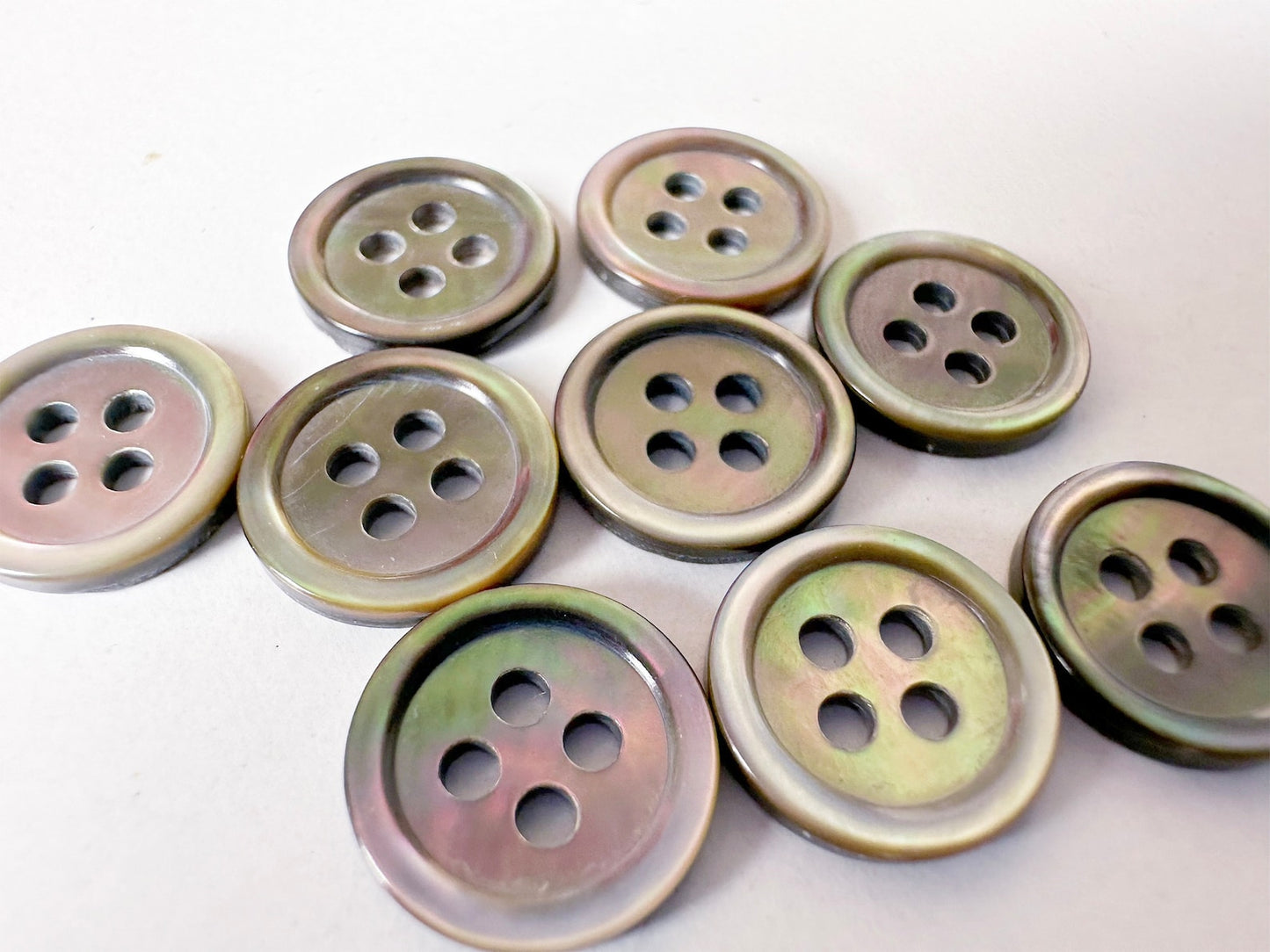 Mother of pearl buttons.